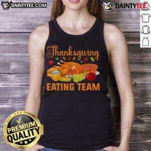 Awesome Thanksgiving eating team wearing turkey day feast tank tops, celebrating food lovers' joy during the holiday.