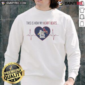 St. Louis Cardinals sweatshirt showcasing 'This Is How My Heart Beats' design, perfect for fans supporting their team.