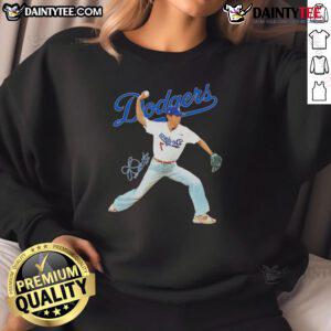 Alt Text: Awesome V BTS x Los Angeles Dodgers sweatshirt in baseball throwing position, showcasing signature style.