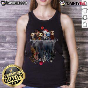 Adorable baby wearing a Halloween tank top featuring cute horror movie villains, perfect for festive fall celebrations.