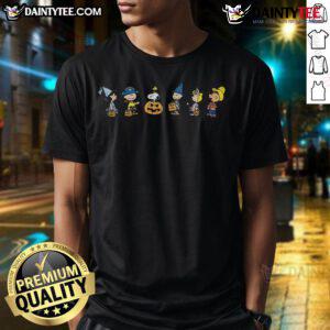 Cute Peanuts Halloween costumes T-shirt featuring cartoon characters in festive attire, perfect for Halloween celebrations.