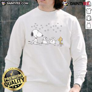 Alt Text: Cute Peanuts Snoopy and Woodstock winter snowman sweatshirt featuring colorful graphics in a cozy design.