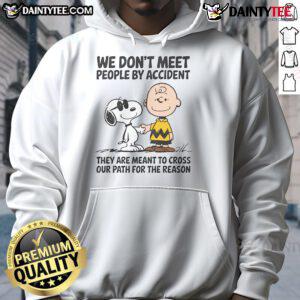 Alt Text: Cute Peanuts Snoopy hoodie with the quote 'We don't meet people by accident' showcasing a stylish design.