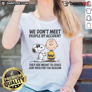 Cute Peanuts Snoopy graphic tee with quote: We don't meet people by accident; they are meant to cross our path.