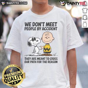 Alt Text: Cute Peanuts Snoopy t-shirt with quote We Don't Meet People By Accident highlighting friendship and fate.