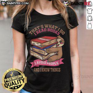 Alt Text: Cute sloth graphic on a ladies tee with the phrase That's what I do: I read books, avoid people, and know things.