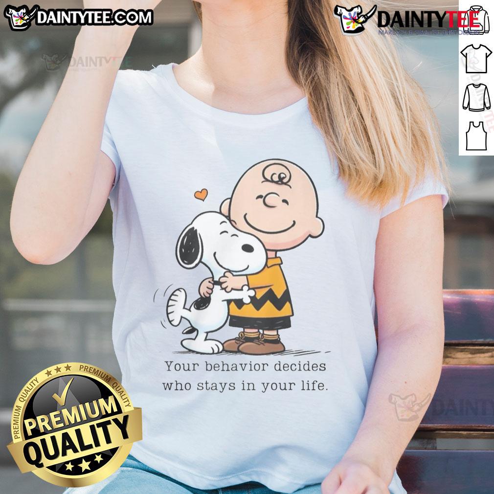 Alt Text: Cute Snoopy Peanuts tee with quote 'Your behavior decides who stays in your life' for ladies' fashion.