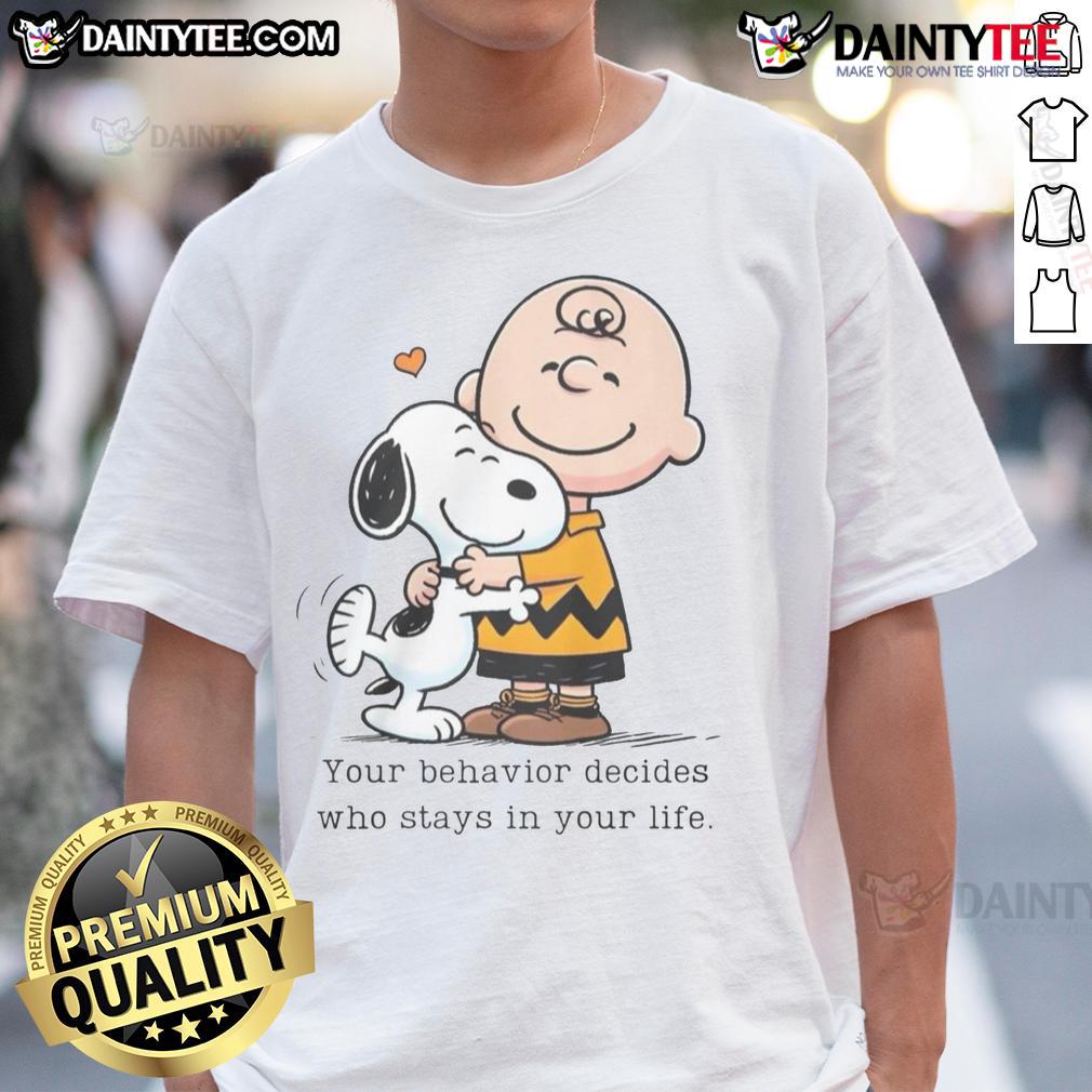 Alt Text: Cute Snoopy Peanuts t-shirt with the phrase Your Behavior Decides Who Stays In Your Life in vibrant colors.