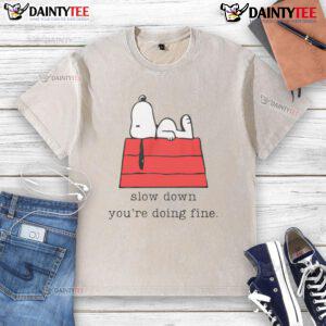 Alt Text: Cute Snoopy Slow Down, You're Doing Fine washed t-shirt featuring a playful Snoopy design for casual wear.