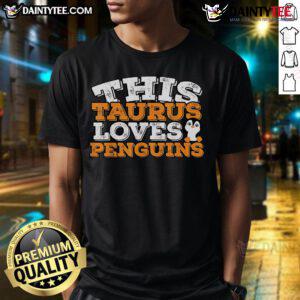 Alt Text: Cute Taurus loves penguins t-shirt featuring a playful design with a Taurus symbol and adorable penguins.