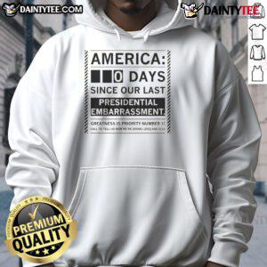 Funny America hoodie showing '0 Days Since Our Last Presidential Embarrassment' text, perfect for political humor lovers.