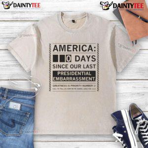 Funny America 0 Day Since Our Last Presidential Embarrassment T-Shirt featuring humorous graphic and bold text design.