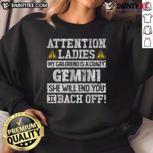 Funny sweatshirt featuring 'Attention Ladies: My Girlfriend is a Crazy Gemini' design, perfect for humor and astrology lovers.
