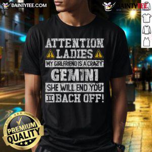 Funny 'Attention Ladies: My Girlfriend Is A Crazy Gemini' T-Shirt showcasing humor and astrology for Gemini lovers.