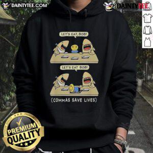 Funny hoodie featuring a shark and a playful punctuation pun: 'Let's eat, Grandma' with commas for English lovers.