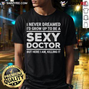Funny I Never Dreamed I'D Be A Sexy Doctor T-Shirt design featuring playful text and a vibrant graphic, perfect for medical professionals.