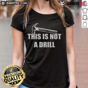 Funny 'This Is Not A Drill' hammer graphic on a ladies tee, perfect for DIY enthusiasts and humor lovers.
