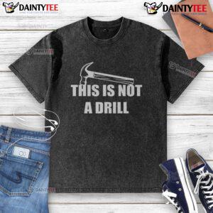 Alt Text: Funny This Is Not A Drill Hammer graphic on a washed t-shirt, perfect for humor lovers and casual wear enthusiasts.
