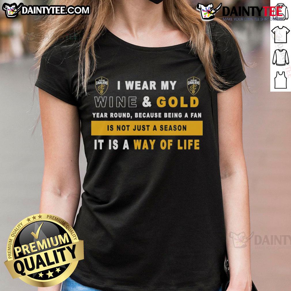 Womens Cleveland Cavaliers tee featuring 'I Wear My Wine And Gold Year Round' slogan, perfect for dedicated fans.
