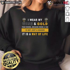 Alt Text: Cleveland Cavaliers sweatshirt with 'I Wear My Wine And Gold Year Round' slogan, perfect for dedicated fans.