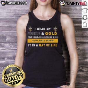 Alt Text: Cleveland Cavaliers tank top featuring 'I Wear My Wine And Gold Year Round' slogan for dedicated fans.