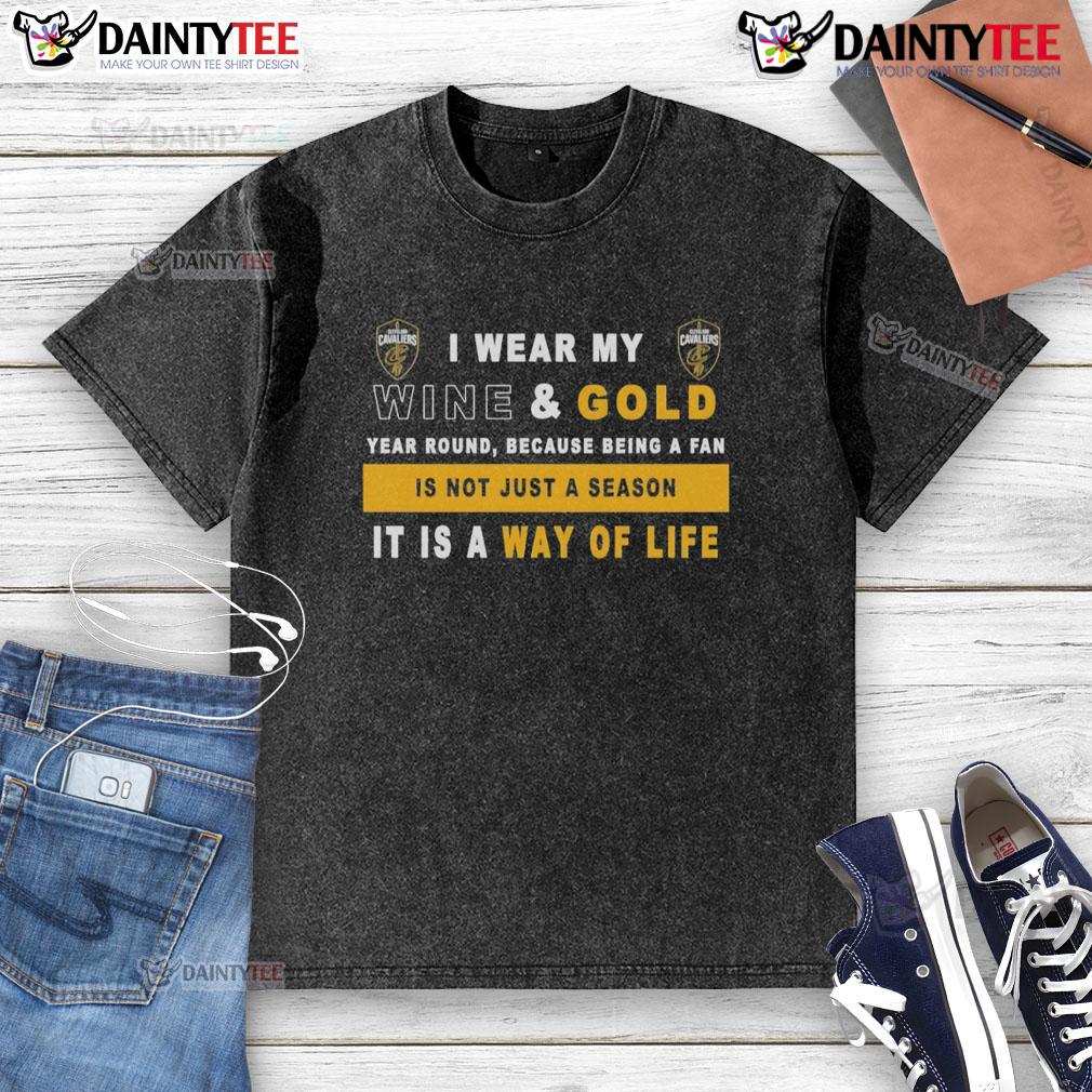 Alt Text: Washed t-shirt featuring 'I Wear My Wine and Gold Year Round' for Cleveland Cavaliers fans, showcasing team spirit.