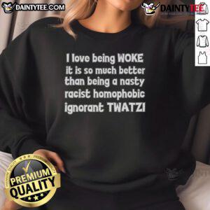 Person wearing 'Good I Love Being Woke' sweatshirt, promoting inclusivity and rejecting racism and homophobia.