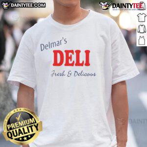 Good Peter Parker showcasing Delmar's Deli fresh and delicious t-shirt in a vibrant urban setting.