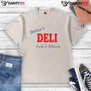 Alt Text: Good Peter Parker wearing Delmar's Deli fresh and delicious washed t-shirt, showcasing a stylish casual look.