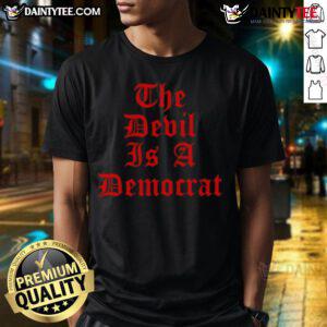 Alt Text: Good The Devil Is A Democrat T-Shirt featuring bold text design, perfect for political humor and statement apparel.