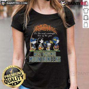 Hot Snoopy Peanuts X Michigan Wolverines tee for ladies celebrating the most wonderful time of the year.