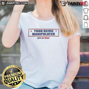 Hot 'Your Being Manipulated' Vote Joe Cross USA Ladies Tee featuring a bold graphic design and vibrant colors.