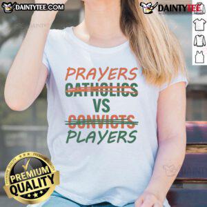 Nice Prayers Vs Players Not Catholics Vs Convicts Ladies Tee showcasing a bold graphic design for spirited women's apparel.