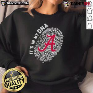Alabama Crimson Tide sweatshirt featuring 'In My DNA' slogan, showcasing team spirit and style for fans.