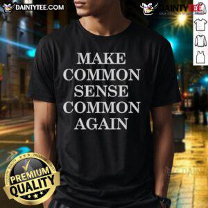 Official Make Common Sense Common Again T-Shirt featuring bold text design on a stylish black fabric.