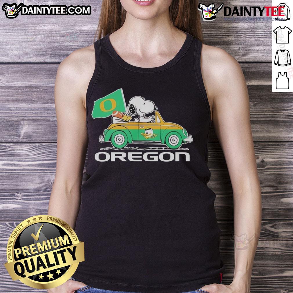 Alt Text: Official Oregon Ducks X Snoopy tank top featuring Snoopy and Woodstock driving a car, perfect for fans.