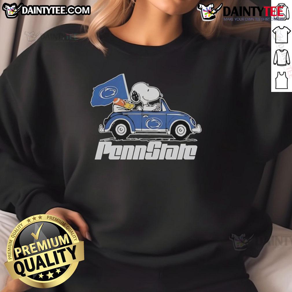 Alt Text: Official Penn State Flag sweatshirt featuring Snoopy and Woodstock driving a car, perfect for fans and casual wear.