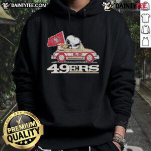 Alt Text: San Francisco 49ers X Snoopy hoodie featuring Woodstock driving a car, perfect for fans and casual wear.