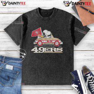 Alt Text: Official San Francisco 49ers x Snoopy with Woodstock driving a car on a washed T-shirt, perfect for fans.
