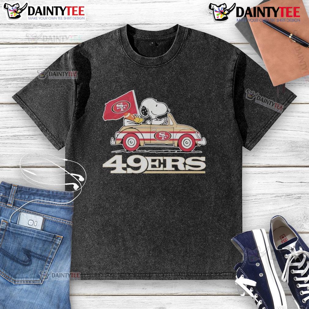 Alt Text: Official San Francisco 49ers x Snoopy with Woodstock driving a car on a washed T-shirt, perfect for fans.