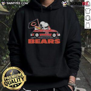 Alt Text: Official Snoopy and Woodstock driving a car on a Chicago Bears hoodie, showcasing fun team spirit and character design.