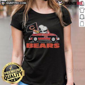 Alt Text: Official Snoopy and Woodstock driving a car on Chicago Bears ladies tee, perfect for fans of Peanuts and NFL.