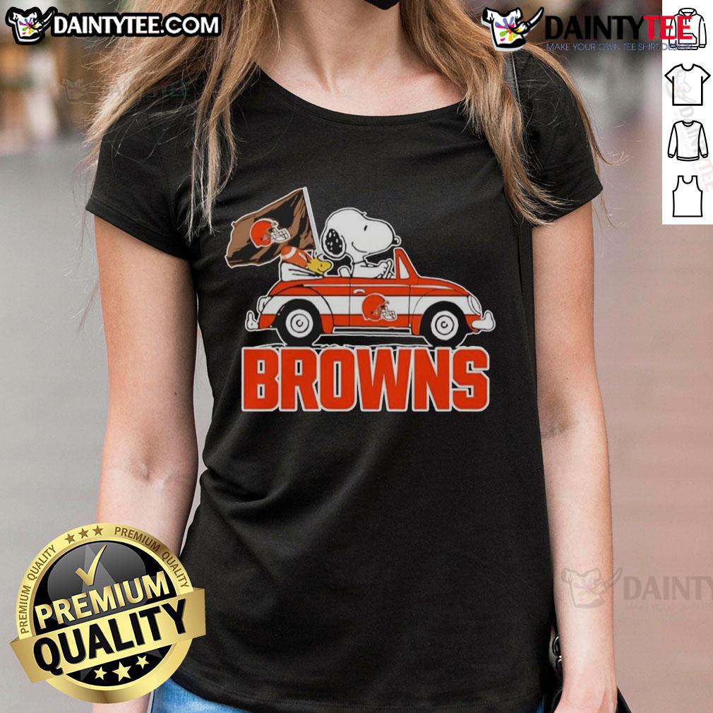 Official Snoopy and Woodstock driving car on Cleveland Browns ladies tee, perfect for fans and casual wear.