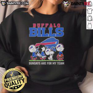 Cozy sweatshirt featuring top Peanuts characters and Buffalo Bills logo, perfect for NFL Sundays and team spirit.