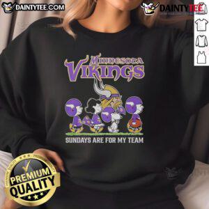 Alt Text: Cozy sweatshirt featuring Top Peanuts characters cheering for the Minnesota Vikings on NFL Sundays.