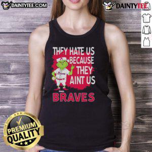 Awesome Atlanta Braves Grinch Christmas tank top design featuring 'They Hate Us Ain't Us' slogan for festive fans.