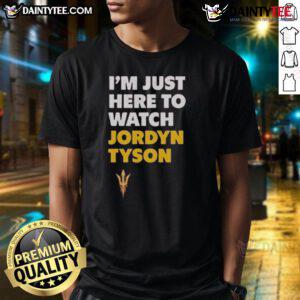 Alt Text: Awesome Jordyn Tyson I'm Just Here To Watch T-Shirt featuring a stylish design perfect for fans and casual wear.