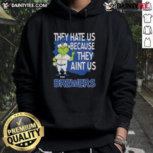 Awesome Milwaukee Brewers Grinch Christmas hoodie featuring 'They Hate Us, Ain't Us' design for festive fans.