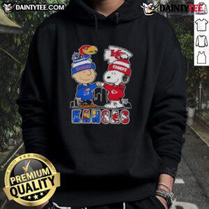 Awesome Snoopy X Charlie Brown hoodie featuring Kansas Sports Jayhawks and Chiefs skyline design.
