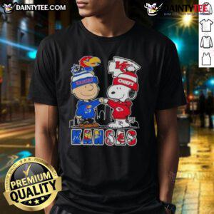 Awesome Snoopy X Charlie Brown Kansas Sports Jayhawks X Chiefs Skyline T-Shirt featuring vibrant graphics and team spirit.